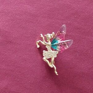 Elegant Fairy Brooch with Multicolor Wings